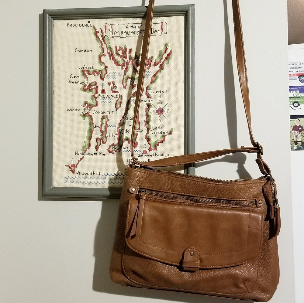 Brown leather purse w/ blue striped lining